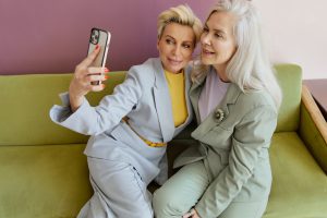 two mature attractive women take a selfie togehter