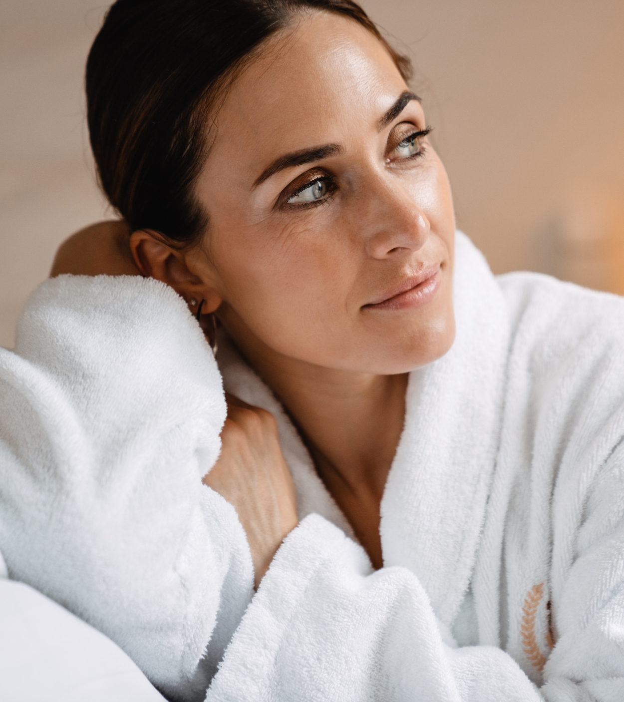 Woman in robe lounging