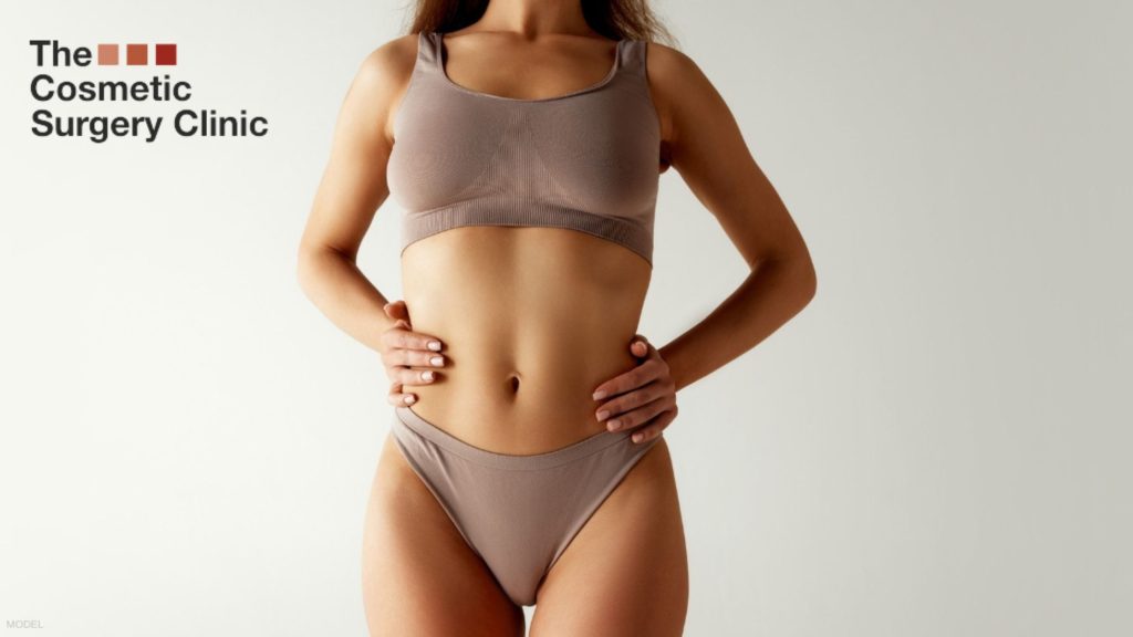 Woman showing off her figure post weight loss (model)